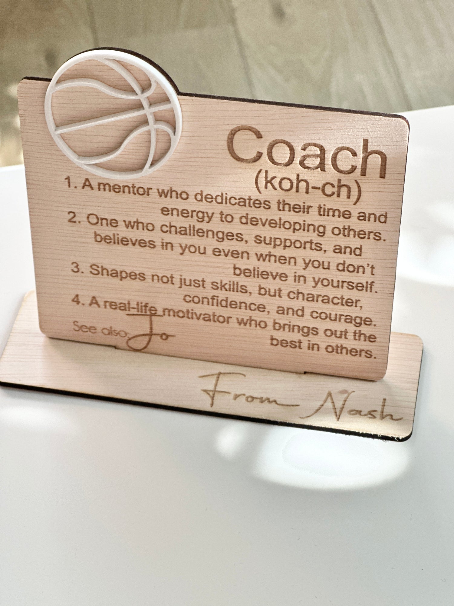 Personalised timber coach gift plaque with engraved message and white acrylic basketball icon – heartfelt thank you present from a child named Nash